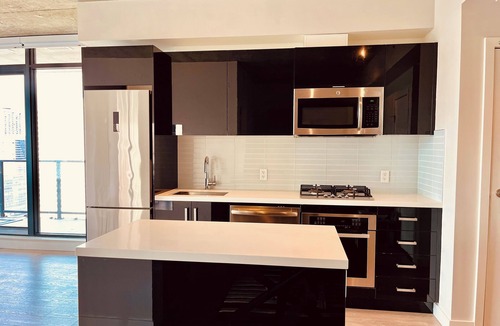 Connaught Condo | Luxury Condo | Pool | Gym | Views | Free Parking | Steps to DT Dining | Walk All