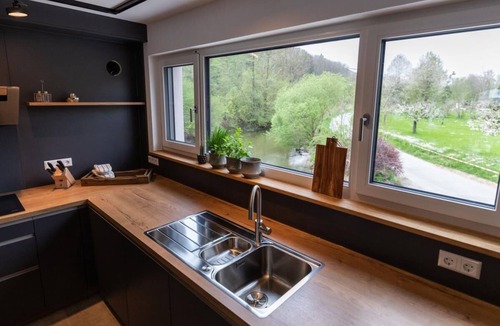 Mulfingen House | Luxury cottage by the river, barrier-free first floor, garden, sauna, fireplace,