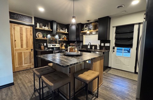 Crivitz Cabin | Luxury creekside cabin near High Falls with views, fire pit & trails nearby