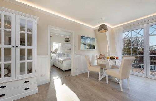 Zingst Apartment | Luxury vacation apartment right by the sea with sauna and fireplace.