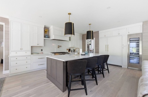 Kennebunk House | Luxury Designer Coastal Retreat | KBK | Heart of Lower Village—walk to shops, restaurants, and beaches, then unwind in your own private backyard oasis.