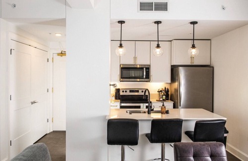 East Town Apartment | Luxury Downtown Apt with Parking, Gym, and Lap Pool · Sleeps 4-5