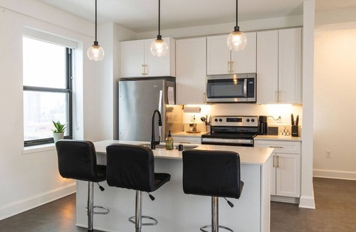 East Town Apartment | Luxury Downtown Apt with Parking, Gym, and Lap Pool · Sleeps 4-5
