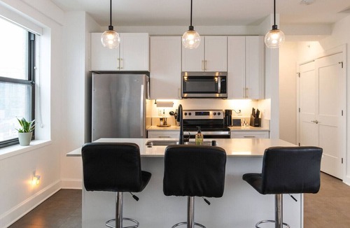 East Town Apartment | Luxury Downtown Apt with Parking, Gym, and Lap Pool · Sleeps 4-5