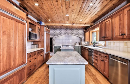 Eagle River House | Luxury Log Home on Eagle River Chain of Lakes! With game room and elevator!