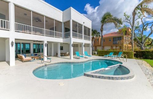 Bayshore Gardens House | Luxury Private Beachfront Retreat Pool Game Room