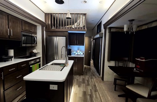Eagle Pass House | Luxury RV with full kitchen sleeps family of 6 inside fenced property