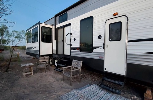 Eagle Pass House | Luxury RV with full kitchen sleeps family of 6 inside fenced property