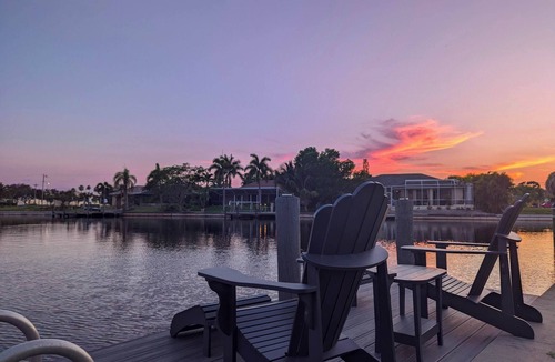 Cape Coral House | Luxury south facing waterfront home with heated salt pool and spa!