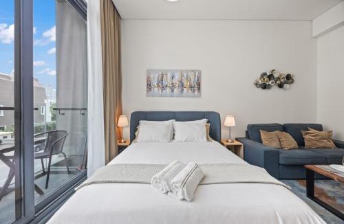 Jumeirah Village Circle Apartment | Luxury Studio with Balcony in JVC