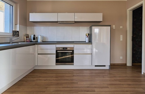 Echternacherbruck Apartment | Luxury suite with infrared sauna, electric fireplace & panoramic abbey view