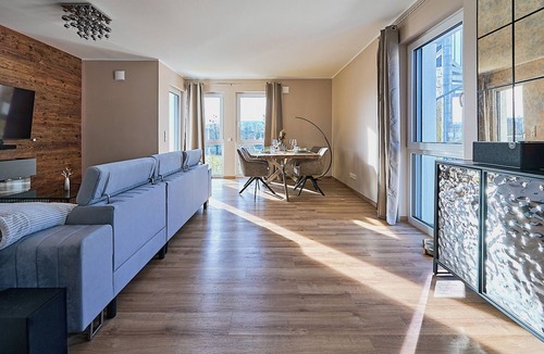 Echternacherbruck Apartment | Luxury suite with infrared sauna, electric fireplace & panoramic abbey view