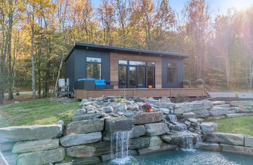 Brackney Cabin | Luxury Tiny House Over a Waterfall on Private Tiny Lake Sleep to Waterfall Sound