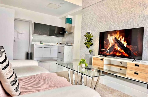 Downtown Santo Domingo Condo | Luxury Upscale City Center Condo, Rooftop Terrace, Jacuzzi, Stunning City Views