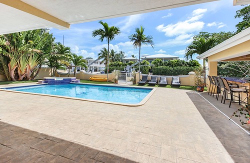 Twin Lakes House | Luxury Water Front Home, Private Pool, Spa, Tiki Bar, 75' Foot Dock with Kayaks