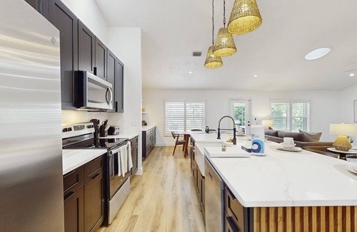 Melbourne House | Luxury Waterfront Escape with Heated Pool, Hot Tub, & Outdoor Patio! 🌊