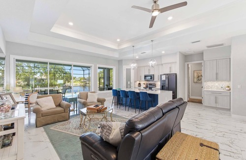 Palm Harbor House | Luxury Waterfront Home Heated Pool Dock Bikes