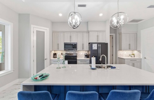 Palm Harbor House | Luxury Waterfront Home Heated Pool Dock Bikes