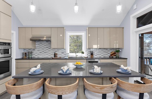 Stevensville House | Luxury Waterfront Escape with Swim Spa, Sauna, Game Room, Beach Access, Fire Pit