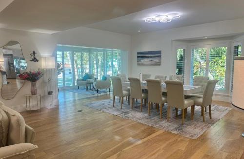 Sanibel House | Luxury Waterfront Villa - Pool, Dock, Game Room etc
