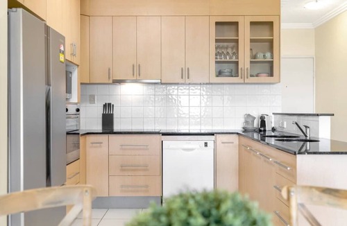 Cairns Central Business District Apartment | Madison Magic: Waterfront Balcony Haven with Pool