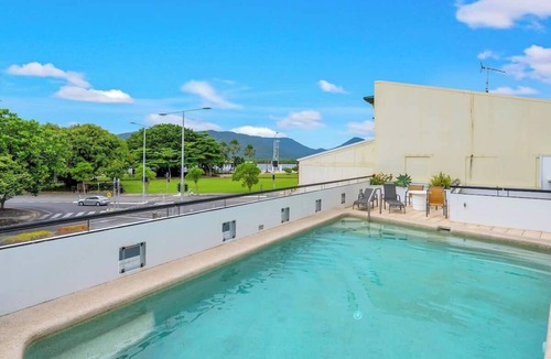 Cairns Central Business District Apartment | Madison Magic: Waterfront Balcony Haven with Pool