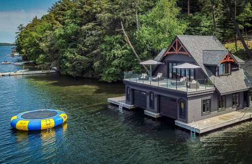 Seguin Cottage | Magnificent 6bdrm 8bath luxury on Lake Joe! Hot Tub! Gym! Boathouse!