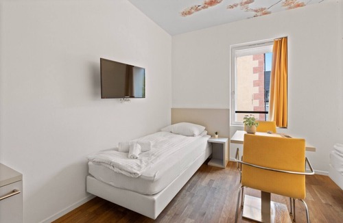 Sierre Hotel | Magnificent triple room in the heart of Sierre