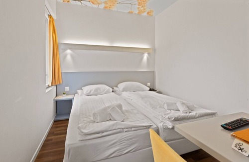 Sierre Hotel | Magnificent triple room in the heart of Sierre
