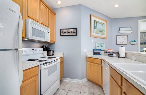 Manistee Condo | Main Floor Poolside Retreat