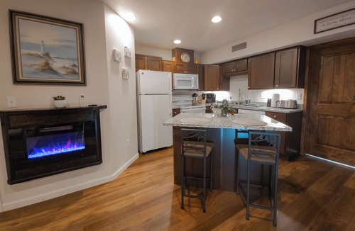 Pinehurst Condo | Main floor studio well-furnished room. Unit 2 with bath/shower bidet toilet