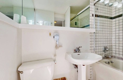West End Cabin | Main Street studio - pool & hot tub - walk to lifts, dog-friendly, balcony