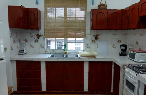 Calibishie House | Mainroad Suite