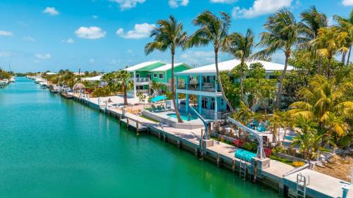 Key Colony Beach House | Maison Blue Sands -120' Dock, HtdPool, Game Room, BBQ, MiniGolf, Baby Items