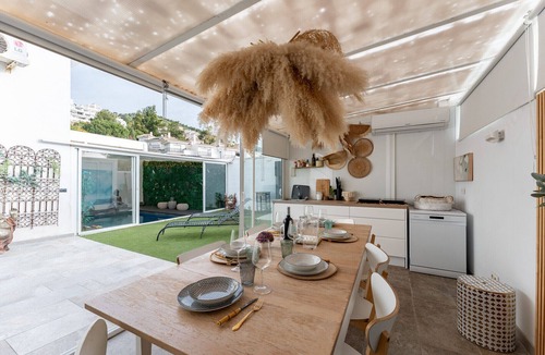Benalmadena Ski Chalet | MalagaSuite Plumaria House