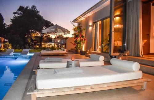 Koukounaries Hotel | Mandraki Village Boutique Hotel