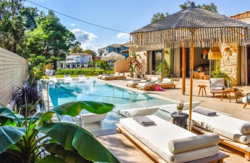 Koukounaries Hotel | Mandraki Village Boutique Hotel