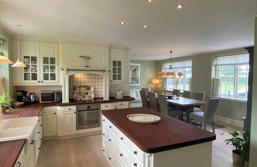 Ringe House | Manor house overlooking fields and garden
