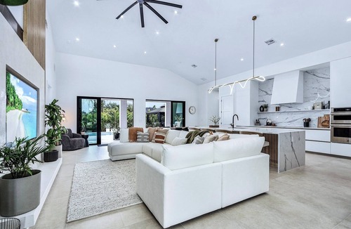 Naples Park House | Maple Shore Homes Welcomes you to Modern Oasis Naples Park!
