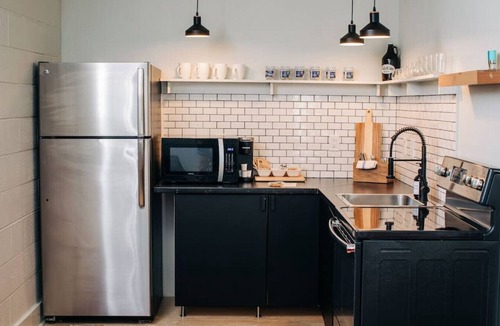 East Market District Apartment | Market #8 · Stellar Suites | The Sunset Suite | NuLu | Bikes