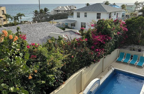 Green Garden Villa | Marvelous 3-bedroom Apartment in Villa, Beautiful Pool, Steps from Surf & Ocean
