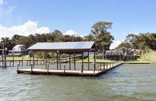 Mary Esther House | Massive Waterfront Wonder with 5 Bedroom & Boat dock/ Pet-Friendly.