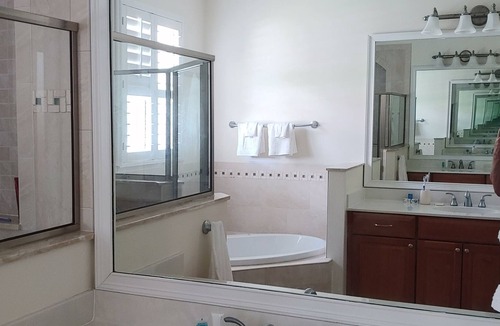 Tropic Apartment | Master bedroom suite with pool. Eight minutes to beaches.