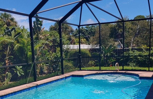 Tropic Apartment | Master bedroom suite with pool. Eight minutes to beaches.