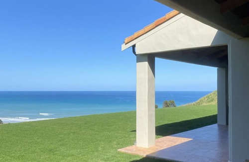 Ocean Beach House | Mediterranean-inspired beach home, surrounded by the Ocean