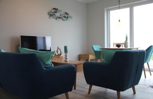 Fehmarnsund Apartment | Meerblick Fehmarnsund 2 - direkt am Strand