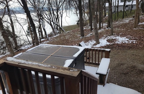 Derby Cabin | Merrymaker Cabin Riverfront with hot tub and Wi-Fi sleeps 8