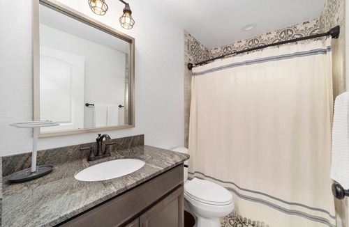 Candler House | Mexican themed LARGE home walking distance to private lake! Fish swim and play!!