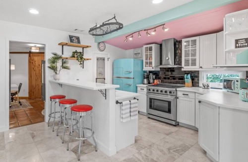 West Palm Beach House | Mid-Century Gem: Pool, Privacy, and Palm Trees