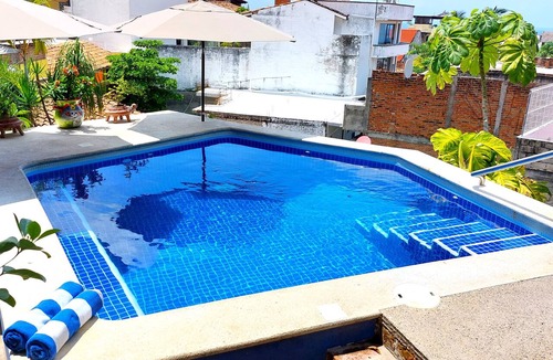 Cerro Apartment | Miguel's Mirador, Top-Floor Ocean View Studio, Private Hammock and Heated Pool